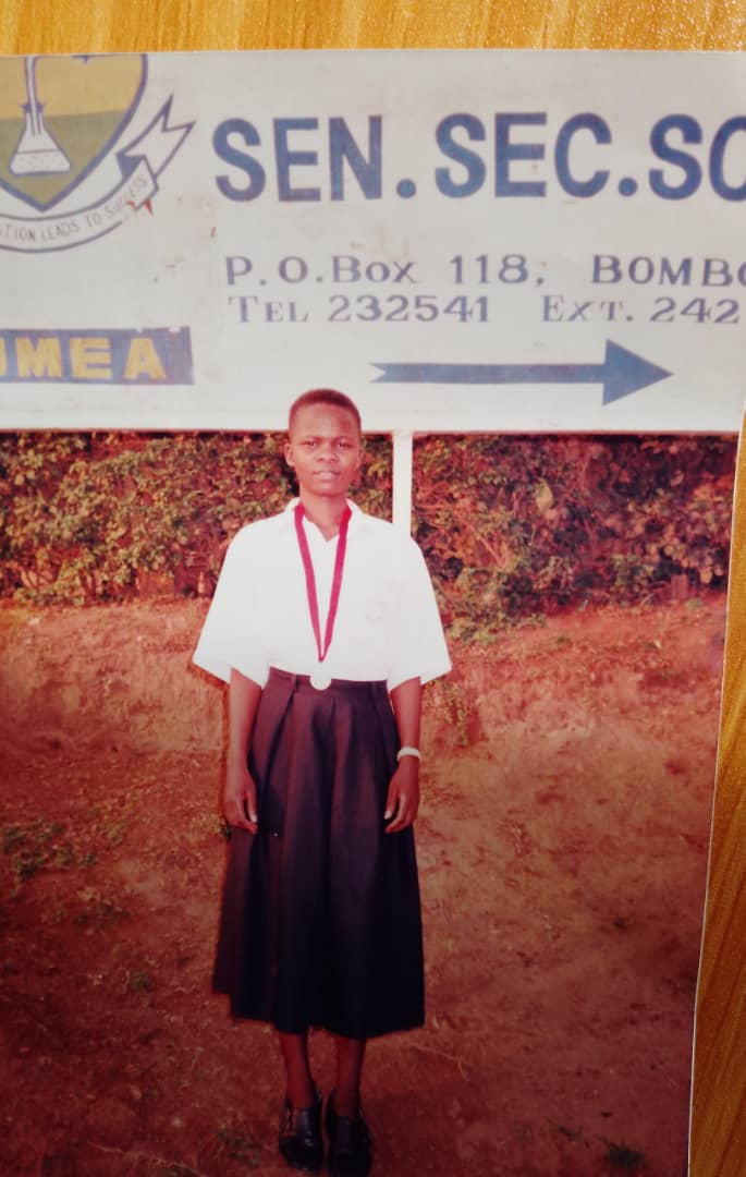Catherine Webombesa with gold medal
